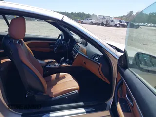 2015 BMW 4 Series 435i xDrive with VIN WBA3T7C51FP942320, listed as a IAAI auction lot 42584318 with 81,814 mi miles and . Bid and sale history available at DreamBid. Image 5.