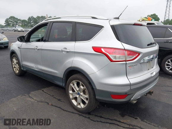 2014 Ford Escape Titanium с VIN 1FMCU0J98EUC28001, выставлен на аукционе IAAI как лот 42442784 с пробегом 163 159 миль миль и . История ставок и продаж доступна на DreamBid. Изображение 3.