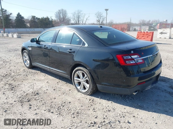 2013 Ford Taurus SEL with VIN 1FAHP2E96DG148836, listed as a IAAI auction lot 42030387 with 192,218 mi miles and . Bid and sale history available at carsss.com. Image 3.