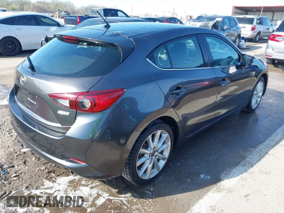 2017 Mazda 3 Touring with VIN 3MZBN1L70HM102817, listed as a IAAI auction lot 41867063 with 100,307 mi miles and . Bid and sale history available at DreamBid. Image 4.