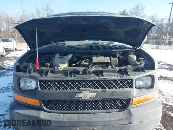 2014 Chevrolet Express Cargo Van with VIN 1GCWGGBA5E1205786, listed as a IAAI auction lot 41339085 with 201,460 mi miles. Bid and sale history available at carsss.com. Image 10.