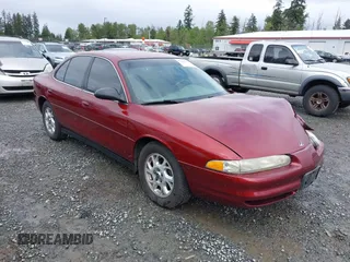 2000 Oldsmobile Intrigue GX z VIN 1G3WH52HXYF300866, wystawiony jako IAAI lot #42315649 z przebiegiem 100 955 mil mil oraz . Historia ofert i sprzedaży dostępna na DreamBid. Obrazek 1.