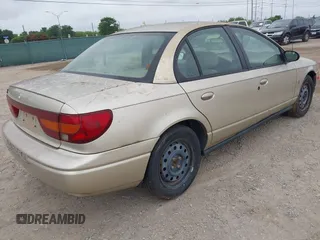 2002 Saturn SL z VIN 1G8ZK52732Z131361, wystawiony jako IAAI lot #42358215 z przebiegiem 228 184 mil mil oraz . Historia ofert i sprzedaży dostępna na DreamBid. Obrazek 4.