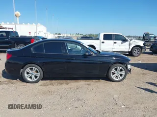 2016 BMW 3 Series 328i xDrive with VIN WBA8E3G55GNU05594, listed as a IAAI auction lot 41634350 with 63,810 mi miles. Bid and sale history available at carsss.com. Image 14.