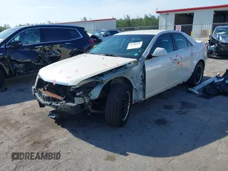2009 Cadillac CTS RWD z VIN 1G6DF577190106800, wystawiony jako IAAI lot #42316470 z przebiegiem 147 836 mil mil oraz . Historia ofert i sprzedaży dostępna na DreamBid. Obrazek 2.