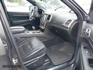 2014 Jeep Grand Cherokee Overland with VIN 1C4RJFCM7EC427204, listed as a IAAI auction lot 41934698 with 147,131 mi miles. Bid and sale history available at carsss.com. Image 5.