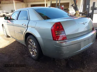 2006 Chrysler 300 C with VIN 2C3LA63H46H290377, listed as a IAAI auction lot 42035128 with 103,847 mi miles and . Bid and sale history available at carsss.com. Image 3.