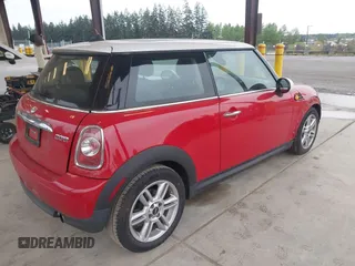 2012 MINI Hardtop with VIN WMWSU3C58CT262077, listed as a IAAI auction lot 42140178 with 70,099 mi miles and . Bid and sale history available at DreamBid. Image 4.