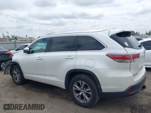 2015 Toyota Highlander XLE z VIN 5TDKKRFH0FS076120, wystawiony jako IAAI lot #42131646 z przebiegiem 117 623 mil mil oraz . Historia ofert i sprzedaży dostępna na DreamBid. Obrazek 14.