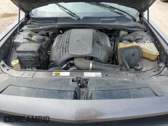 2013 Dodge Challenger R/T Classic z VIN 2C3CDYBT3DH667951, wystawiony jako Copart lot #55301675 z przebiegiem Nie podano mil oraz Szkoda całkowita • Salvage title. Historia ofert i sprzedaży dostępna na DreamBid. Obrazek 11.