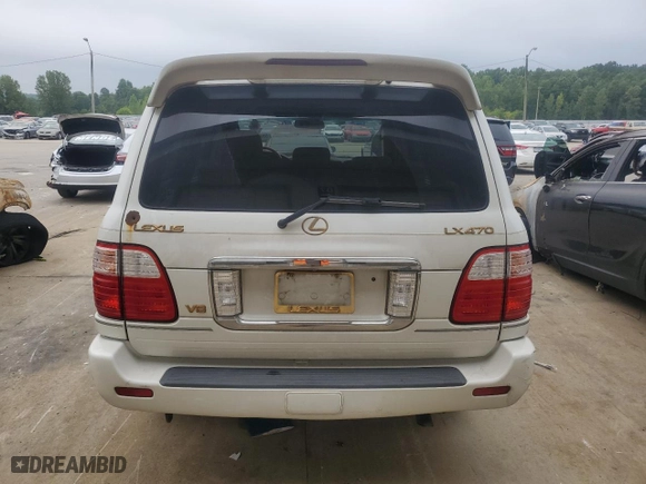2004 Lexus LX 470 with VIN JTJHT00W743538680, listed as a Copart auction lot 66269864 with 201,802 mi miles and Salvage Title. Bid and sale history available at carsss.com. Image 6.