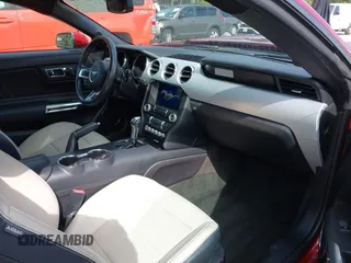 2016 Ford Mustang EcoBoost z VIN 1FA6P8TH5G5333819, wystawiony jako IAAI lot #42327887 z przebiegiem 124 870 mil mil oraz . Historia ofert i sprzedaży dostępna na DreamBid. Obrazek 5.