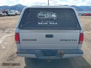2003 Dodge Dakota Sport with VIN 1D7HG38N63S321703, listed as a IAAI auction lot 41807402 with 252,984 mi miles. Bid and sale history available at carsss.com. Image 6.
