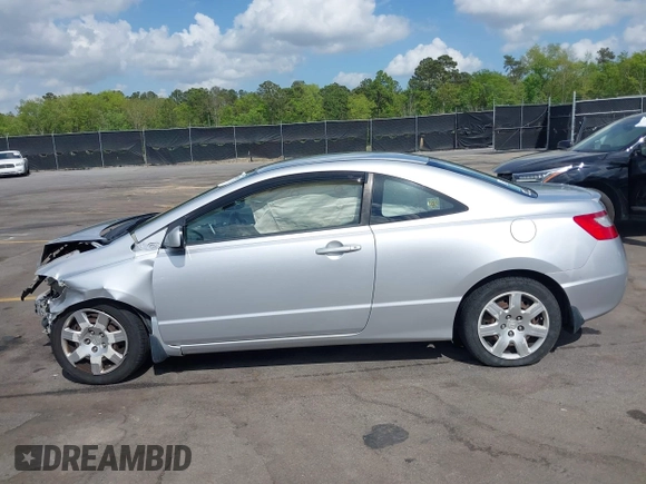 2010 Honda Civic Cpe LX with VIN 2HGFG1B68AH530485, listed as a IAAI auction lot 41907809 with 275,653 mi miles. Bid and sale history available at carsss.com. Image 14.