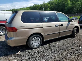 2000 Honda Odyssey LX z VIN 2HKRL1856YH626249, wystawiony jako Copart lot #57246805 z przebiegiem 179 546 mil mil oraz Szkoda całkowita • Salvage title. Historia ofert i sprzedaży dostępna na DreamBid. Obrazek 3.