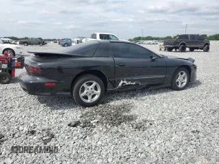 1995 Pontiac Firebird Trans Am z VIN 2G2FV22P8S2251923, wystawiony jako Copart lot #54007135 z przebiegiem 35 218 mil mil oraz Szkody całkowita. Historia ofert i sprzedaży dostępna na DreamBid. Obrazek 3.