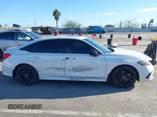 2024 Honda Civic Si with VIN 2HGFE1E51RH470618, listed as a IAAI auction lot 41756006 with 15,056 mi miles and . Bid and sale history available at DreamBid. Image 6.
