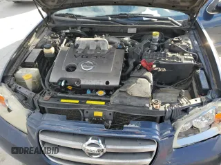 2003 Nissan Maxima SE z VIN JN1DA31A33T434264, wystawiony jako Copart lot #42189665 z przebiegiem 230 582 mil mil oraz Czysty tytuł • Clean title. Historia ofert i sprzedaży dostępna na DreamBid. Obrazek 13.