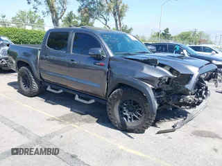 2021 Toyota Tacoma SR z VIN 5TFCZ5AN1MX274315, wystawiony jako IAAI lot #42273054 z przebiegiem 67 863 mil mil oraz . Historia ofert i sprzedaży dostępna na DreamBid. Obrazek 1.