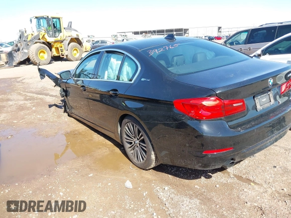 2019 BMW 5 Series 530e iPerformance with VIN WBAJA9C55KB392765, listed as a IAAI auction lot 41748610 with 60,834 mi miles. Bid and sale history available at carsss.com. Image 3.
