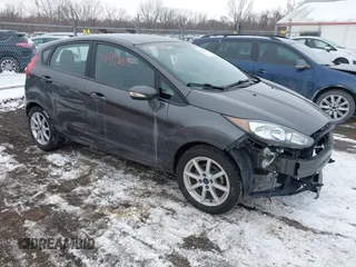 2017 Ford Fiesta SE with VIN 3FADP4EJ7HM157352, listed as a IAAI auction lot 41592897 with 120,446 mi miles. Bid and sale history available at carsss.com. Image 1.