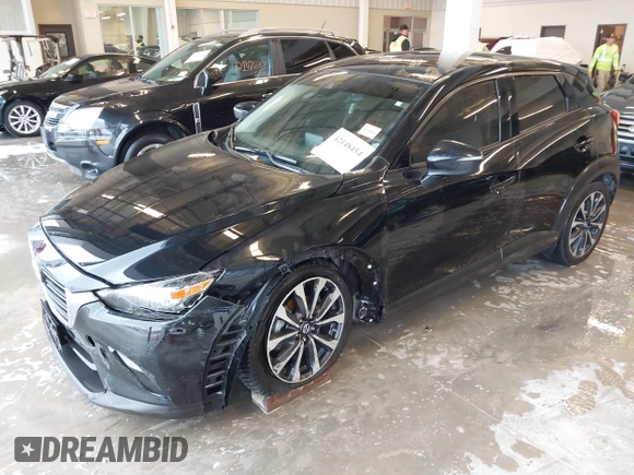 2019 Mazda CX-3 Touring z VIN JM1DKDC70K0404219, wystawiony jako IAAI lot #42148454 z przebiegiem 80 539 mil mil oraz . Historia ofert i sprzedaży dostępna na DreamBid. Obrazek 18.