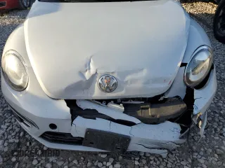 2018 Volkswagen Beetle S with VIN 3VW5DAAT7JM506557, listed as a Copart auction lot 84736194 with 34,930 mi miles and Salvage title. Bid and sale history available at DreamBid. Image 12.