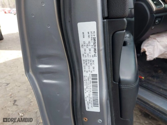 2014 Jeep Grand Cherokee Laredo with VIN 1C4RJFAG7EC270593, listed as a IAAI auction lot 41609865 with 184,145 mi miles. Bid and sale history available at carsss.com. Image 9.