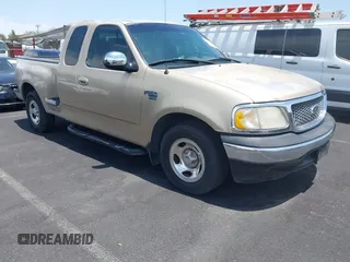 1999 Ford F-150 XL with VIN 1FTRX07LXXKB15707, listed as a IAAI auction lot 42422178 with Not provided miles and . Bid and sale history available at DreamBid. Image 1.