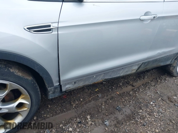 2013 Ford Escape Titanium with VIN 1FMCU9J90DUC22888, listed as a IAAI auction lot 41664550 with 185,568 mi miles and . Bid and sale history available at DreamBid. Image 6.