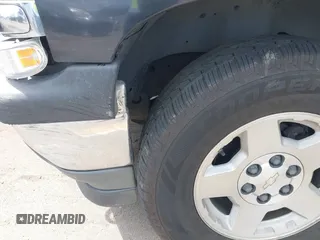 2005 Chevrolet Tahoe LS z VIN 1GNEK13T05J124225, wystawiony jako IAAI lot #41699401 z przebiegiem 253 632 mil mil oraz . Historia ofert i sprzedaży dostępna na DreamBid. Obrazek 18.