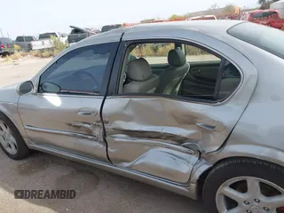 2002 Nissan Maxima GLE z VIN JN1DA31A22T302286, wystawiony jako IAAI lot #41929154 z przebiegiem 249 531 mil mil oraz . Historia ofert i sprzedaży dostępna na DreamBid. Obrazek 14.