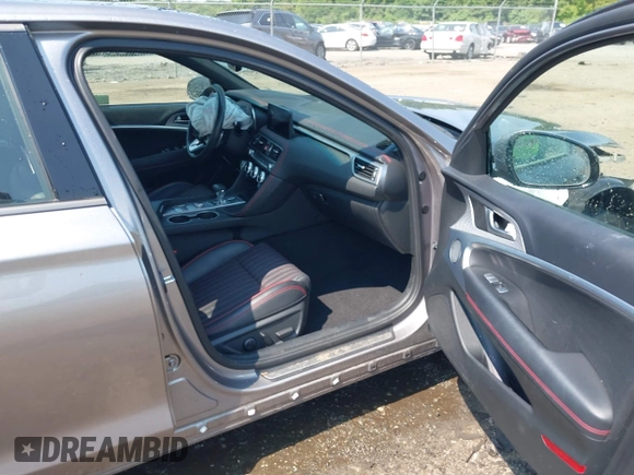2023 Genesis G70 2.0T with VIN KMTG34TA2PU121151, listed as a IAAI auction lot 42425161 with 19,646 mi miles and . Bid and sale history available at DreamBid. Image 5.