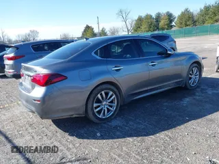 2018 Infiniti Q70 Luxe with VIN JN1BY1AR3JM220783, listed as a IAAI auction lot 41480241 with 95,739 mi miles and . Bid and sale history available at DreamBid. Image 4.