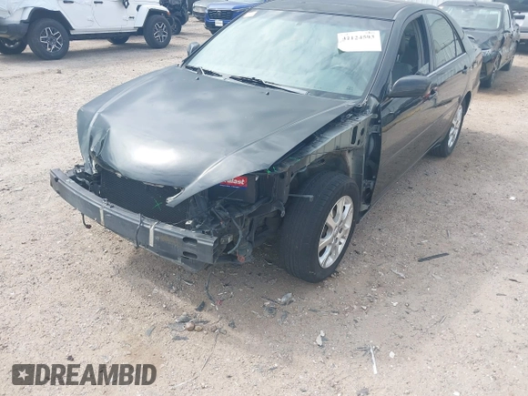 2005 Toyota Camry LE with VIN 4T1BF32K15U091945, listed as a IAAI auction lot 42124503 with 212,951 mi miles and . Bid and sale history available at DreamBid. Image 6.