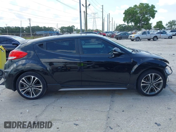 2016 Hyundai Veloster Turbo z VIN KMHTC6AEXGU281207, wystawiony jako IAAI lot #42197497 z przebiegiem 107 431 mil mil oraz . Historia ofert i sprzedaży dostępna na DreamBid. Obrazek 13.