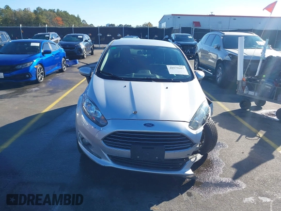 2019 Ford Fiesta SE with VIN 3FADP4EJ0KM107058, listed as a IAAI auction lot 40979683 with 116,854 mi miles. Bid and sale history available at carsss.com. Image 12.