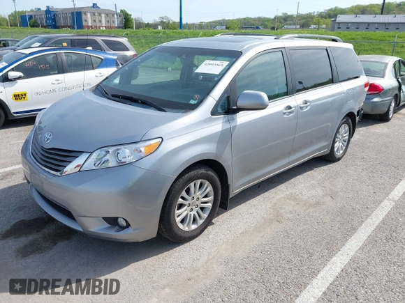 2014 Toyota Sienna XLE with VIN 5TDYK3DC0ES451307, listed as a IAAI auction lot 42093569 with 105,721 mi miles and . Bid and sale history available at DreamBid. Image 19.