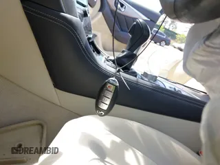 2015 Infiniti Q50 Premium z VIN JN1BV7AR4FM410949, wystawiony jako IAAI lot #42243917 z przebiegiem 56 552 mil mil oraz . Historia ofert i sprzedaży dostępna na DreamBid. Obrazek 11.