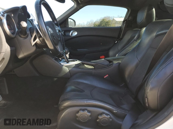 2014 Nissan 370Z Touring with VIN JN1AZ4EH1EM635411, listed as a Copart auction lot 82670344 with 77,501 mi miles and Salvage Title. Bid and sale history available at carsss.com. Image 7.