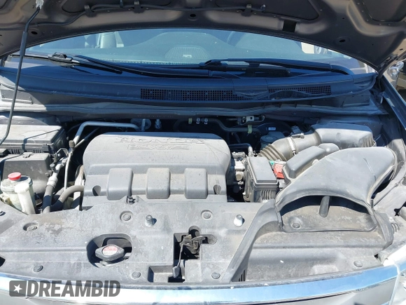 2012 Honda Odyssey EX-L with VIN 5FNRL5H64CB127523, listed as a IAAI auction lot 39818448 with 102,514 mi miles and . Bid and sale history available at DreamBid. Image 10.