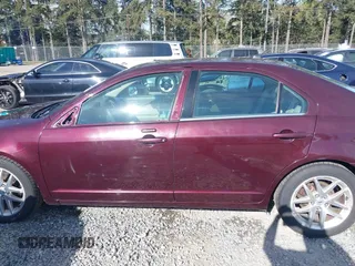 2011 Ford Fusion SEL with VIN 3FAHP0JA7BR220265, listed as a IAAI auction lot 42019909 with 170,287 mi miles. Bid and sale history available at carsss.com. Image 15.