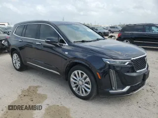 2022 Cadillac XT6 Premium Luxury z VIN 1GYKPERS4NZ105532, wystawiony jako Copart lot #51960895 z przebiegiem 99 336 mil mil oraz Szkoda całkowita • Salvage title. Historia ofert i sprzedaży dostępna na DreamBid. Obrazek 4.