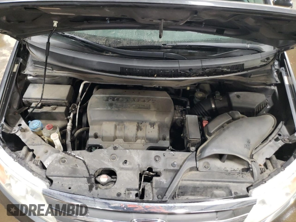 2012 Honda Odyssey EX-L with VIN 5FNRL5H69CB143572, listed as a Copart auction lot 48614255 with 114,490 mi miles and Salvage Title. Bid and sale history available at carsss.com. Image 12.