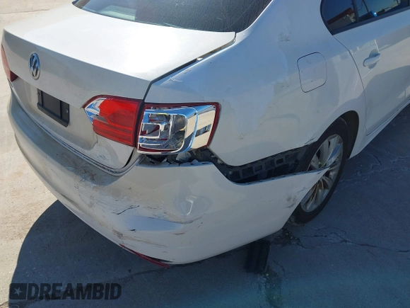 2013 Volkswagen Jetta S with VIN 3VW2K7AJ9DM301028, listed as a IAAI auction lot 41839078 with 156,649 mi miles and . Bid and sale history available at DreamBid. Image 6.