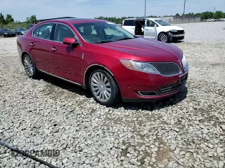 2013 Lincoln MKS z VIN 1LNHL9DK5DG607319, wystawiony jako Copart lot #54302285 z przebiegiem 170 099 mil mil oraz Szkoda całkowita • Salvage title. Historia ofert i sprzedaży dostępna na DreamBid. Obrazek 13.