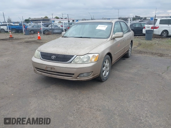 2001 Toyota Avalon XL w/Bucket Seats with VIN 4T1BF28B91U173868, listed as a IAAI auction lot 41721904 with 325,097 mi miles. Bid and sale history available at carsss.com. Image 2.