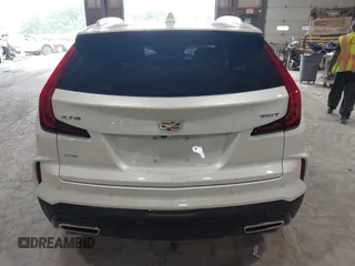 2024 Cadillac XT4 AWD Premium Luxury z VIN 1GYFZDR47RF206465, wystawiony jako IAAI lot #42562562 z przebiegiem 5 951 mil mil oraz . Historia ofert i sprzedaży dostępna na DreamBid. Obrazek 17.