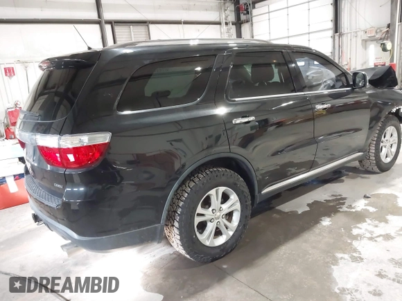 2013 Dodge Durango Crew with VIN 1C4SDJDT9DC670738, listed as a IAAI auction lot 41329419 with 149,520 mi miles and . Bid and sale history available at DreamBid. Image 4.