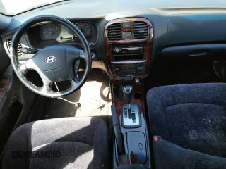 2002 Hyundai Sonata GLS with VIN KMHWF35H12A702457, listed as a Copart auction lot 60985574 with 99,698 mi miles and Salvage Title. Bid and sale history available at carsss.com. Image 8.